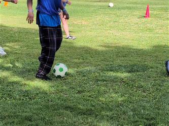 students play soccer