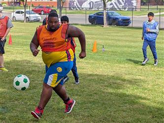 students play soccer