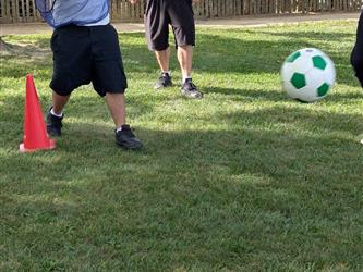 students play soccer